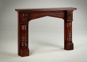 картинка Старинный резной портал для камина с опорами, декорированными утолщениями и каннелюрами салоне старинных вещей "Шебби" являющийся официальным дистрибьютором в России и Беларуси