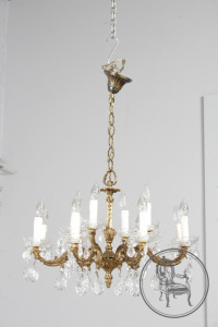 картинка Антикварная люстра из бронзы с хрустальными подвесками на 8 рожков салоне старинных вещей "Шебби" являющийся официальным дистрибьютором в России и Беларуси