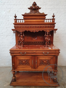 картинка Антикварный поставец в стиле ренессанс с антропоморфными колоннами салоне старинных вещей "Шебби" являющийся официальным дистрибьютором в России и Беларуси