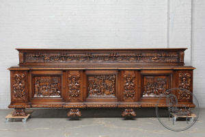 картинка Антикварный комод с сюжетной резбой в стиле Брейгель салоне старинных вещей "Шебби" являющийся официальным дистрибьютором в России и Беларуси