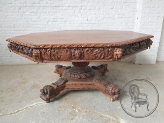 Антикварный стол в стиле Ренессанс, декорированный маскаронами и ножками в виде лап животных код. BE4161629