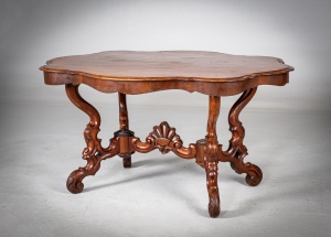 Антикварный стол с фигурной (серпантинной) столешницей и изящным резным подстольем код.&nbsp;RM4165874