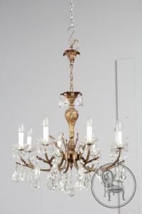 картинка Старинная люстра из бронзы на 8 рожков с хрустальными подвесками салоне старинных вещей "Шебби" являющийся официальным дистрибьютором в России и Беларуси